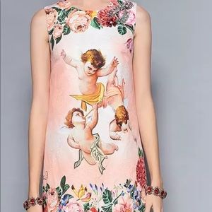 Dress with broderies and crystal ornement in pink